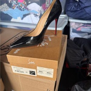 Christian Louboutin Black Heels with High Stiletto and Pointed Toe